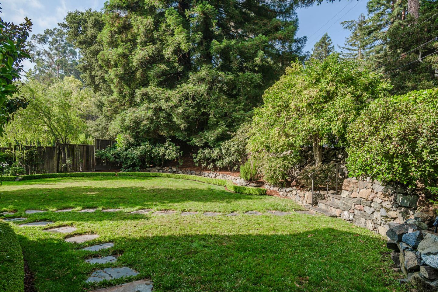 595 Hayne Road Hillsborough, CA 94010 - Photo 61 of 71 a view of a grassy field with trees