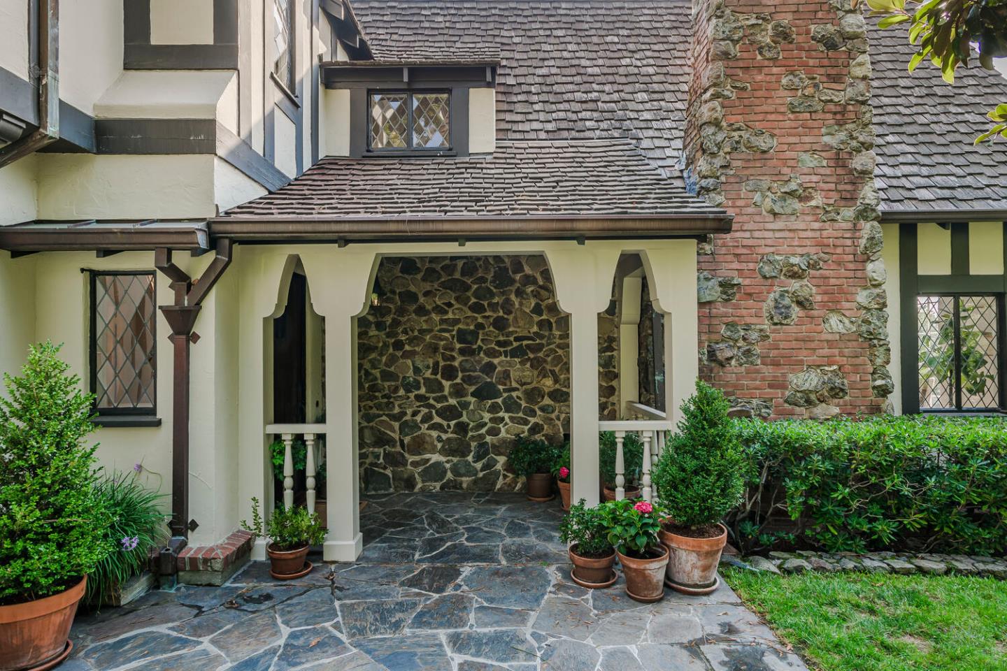 595 Hayne Road Hillsborough, CA 94010 - Photo 64 of 71 a front view of a house with plants