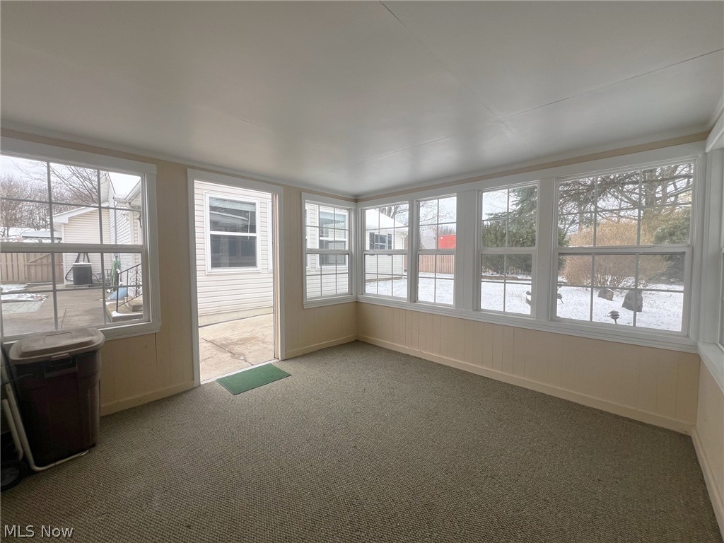 5203 Ridgeland Street Lorain, OH 44055 - Photo 32 of 39 Unfurnished sunroom with a wealth of natural light