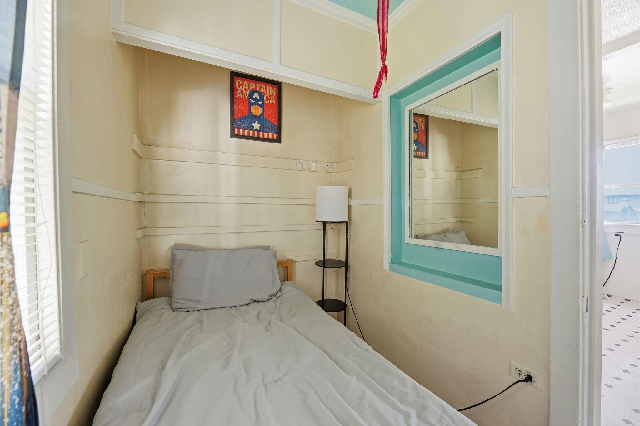 1813 Sacramento Street Berkeley, CA 94703 - Photo 10 of 31 a bathroom with a bathtub and a shower