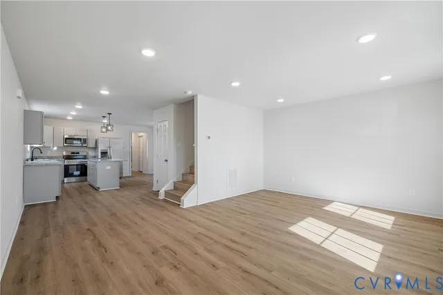 a view of kitchen with wooden floor
