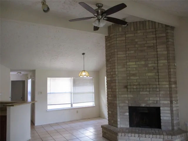 a view of a storage and utility room with a sink