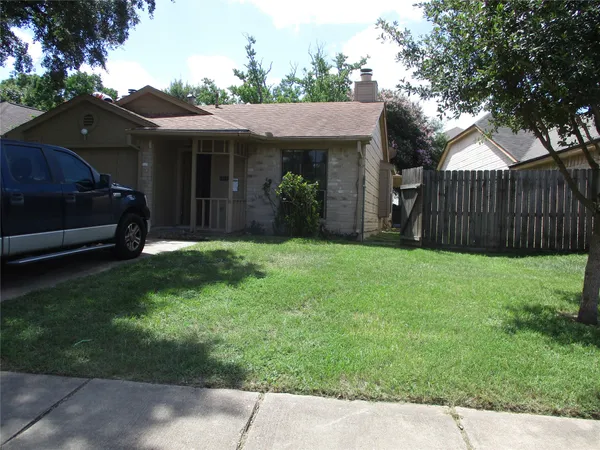 a view of a house with a garden