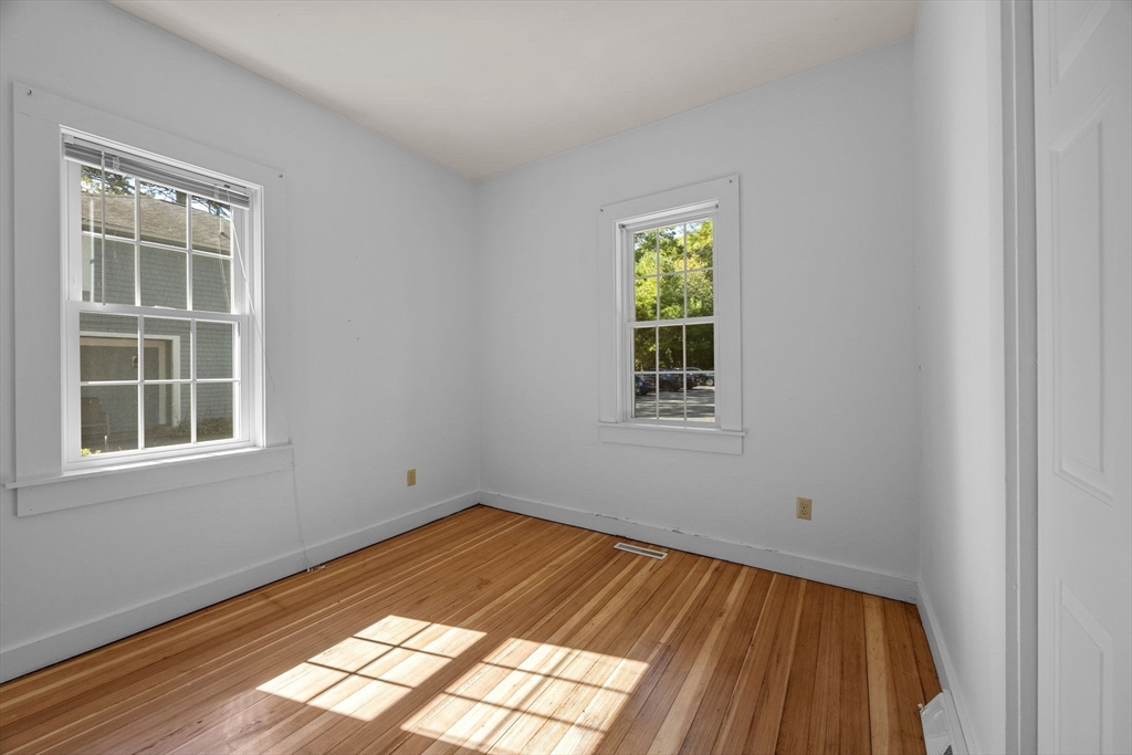3040 Falmouth Road, Unit H Barnstable, MA 02655 - Photo 11 of 26 a view of empty room with windows