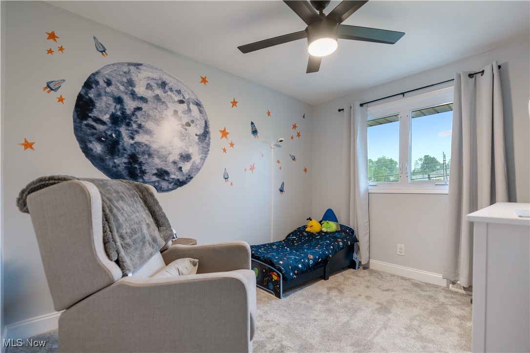 594 Long Ridge Drive Independence, OH 44131 - Photo 21 of 36 Carpeted bedroom featuring baseboards and a ceiling fan