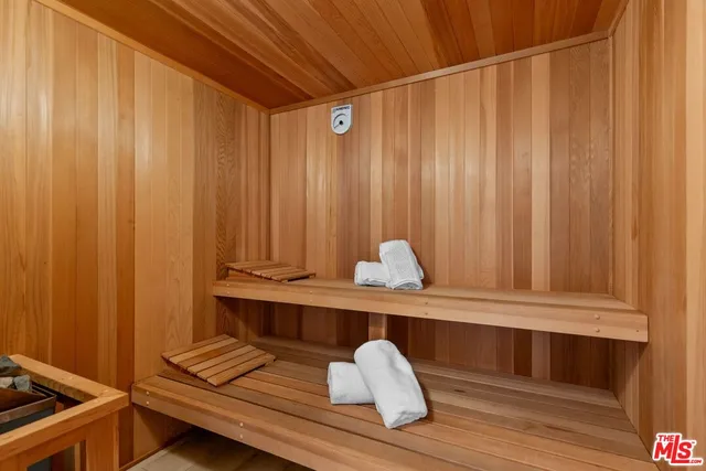 a view of room with window and wooden floor