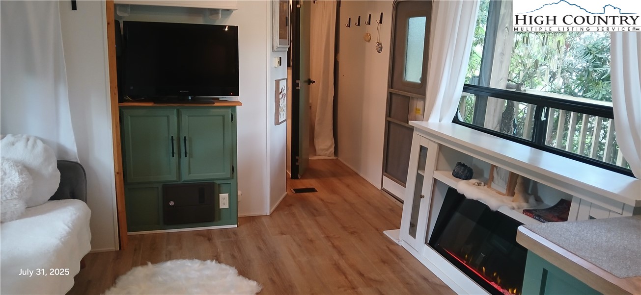 158 Trillium Road Newland, NC 28657 - Photo 9 of 12 a living room with furniture and a flat screen tv