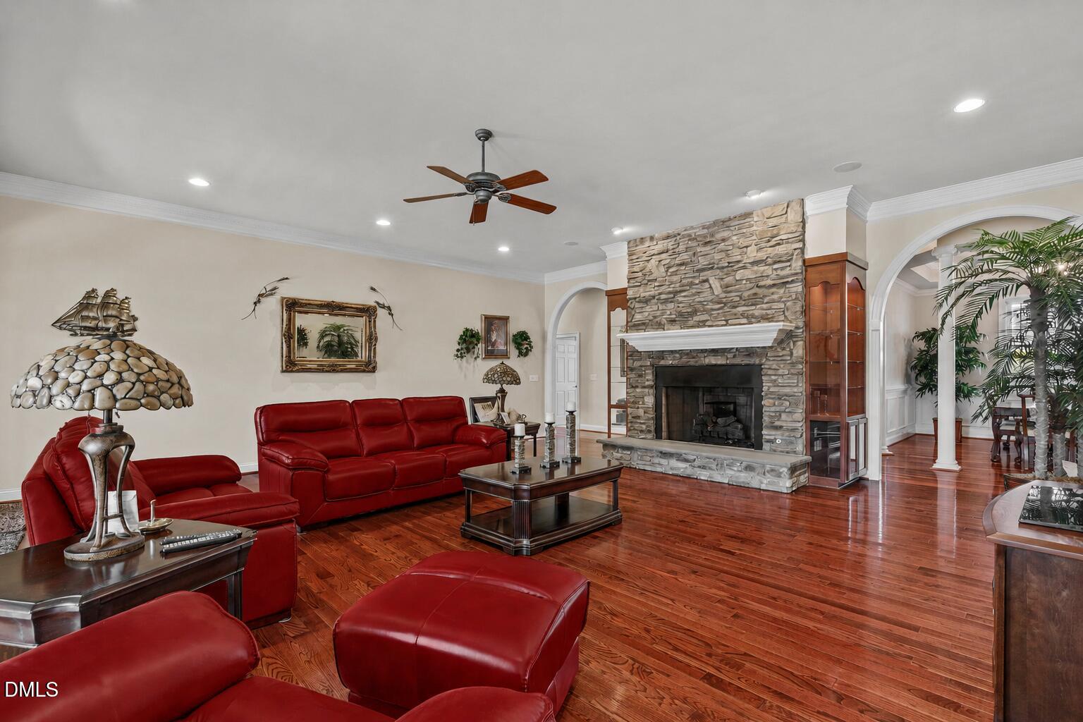 10917 Jordan Road Raleigh, NC 27603 - Photo 5 of 58 a living room with furniture and a fireplace