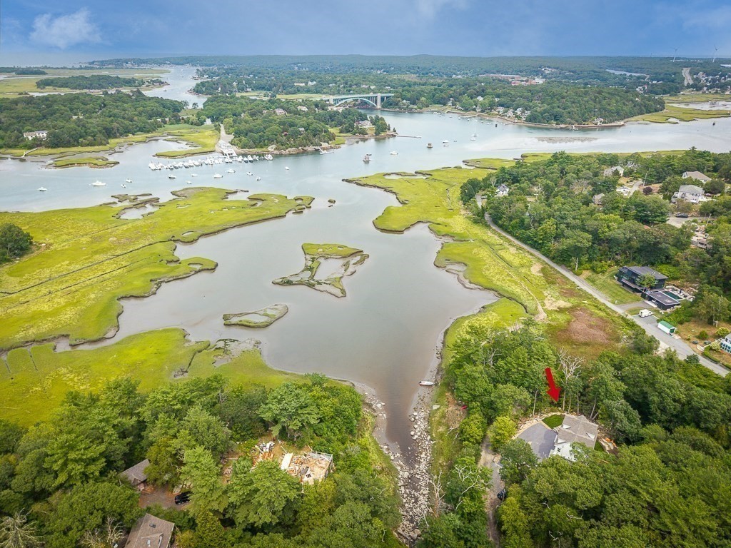 5 Samoset Road, Unit A Gloucester, MA 01930 - Photo 3 of 41 a view of a lake with a beach