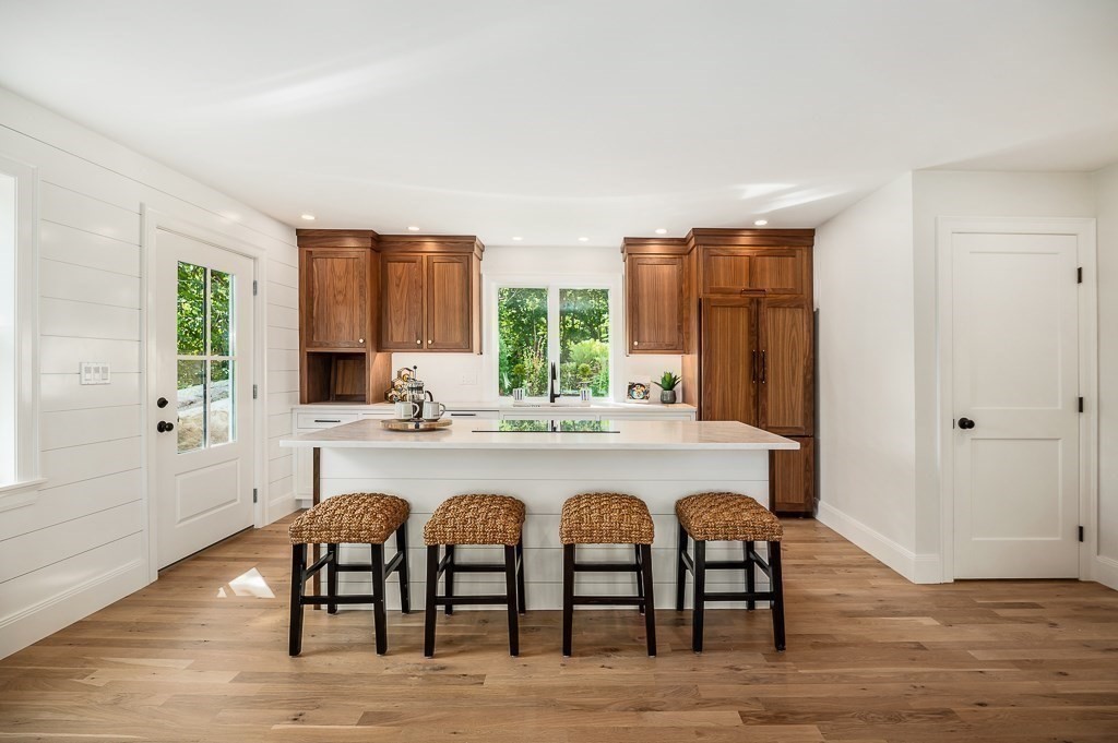 5 Samoset Road, Unit A Gloucester, MA 01930 - Photo 10 of 41 a large white kitchen with a window and refrigerator