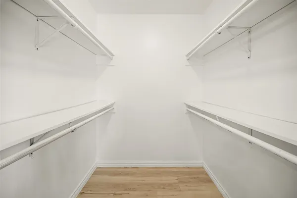 a view of an empty walk in closet
