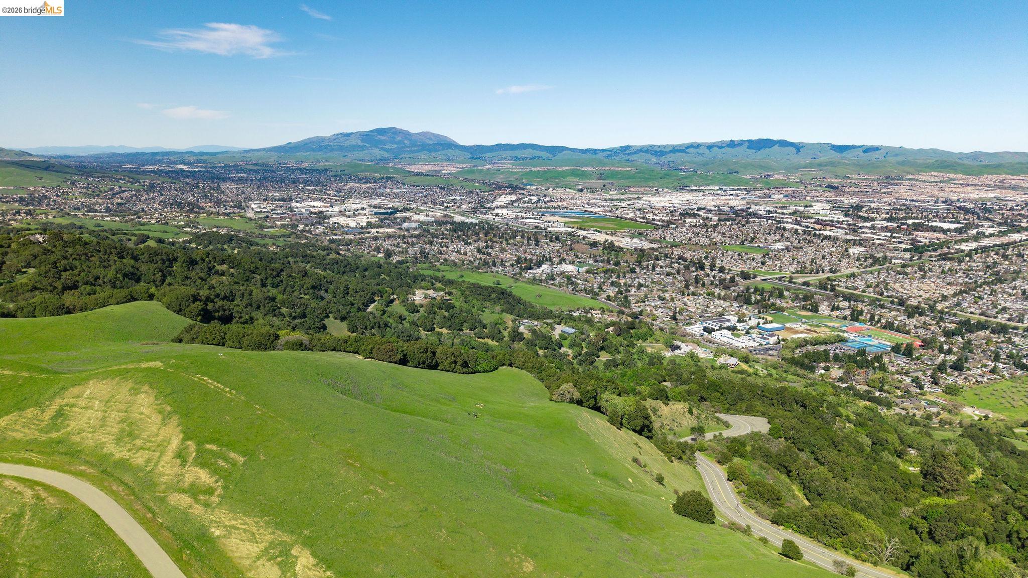 0 Santos Ranch Road Pleasanton, CA 94588 - Photo 2 of 18 a view of a city with lush green forest