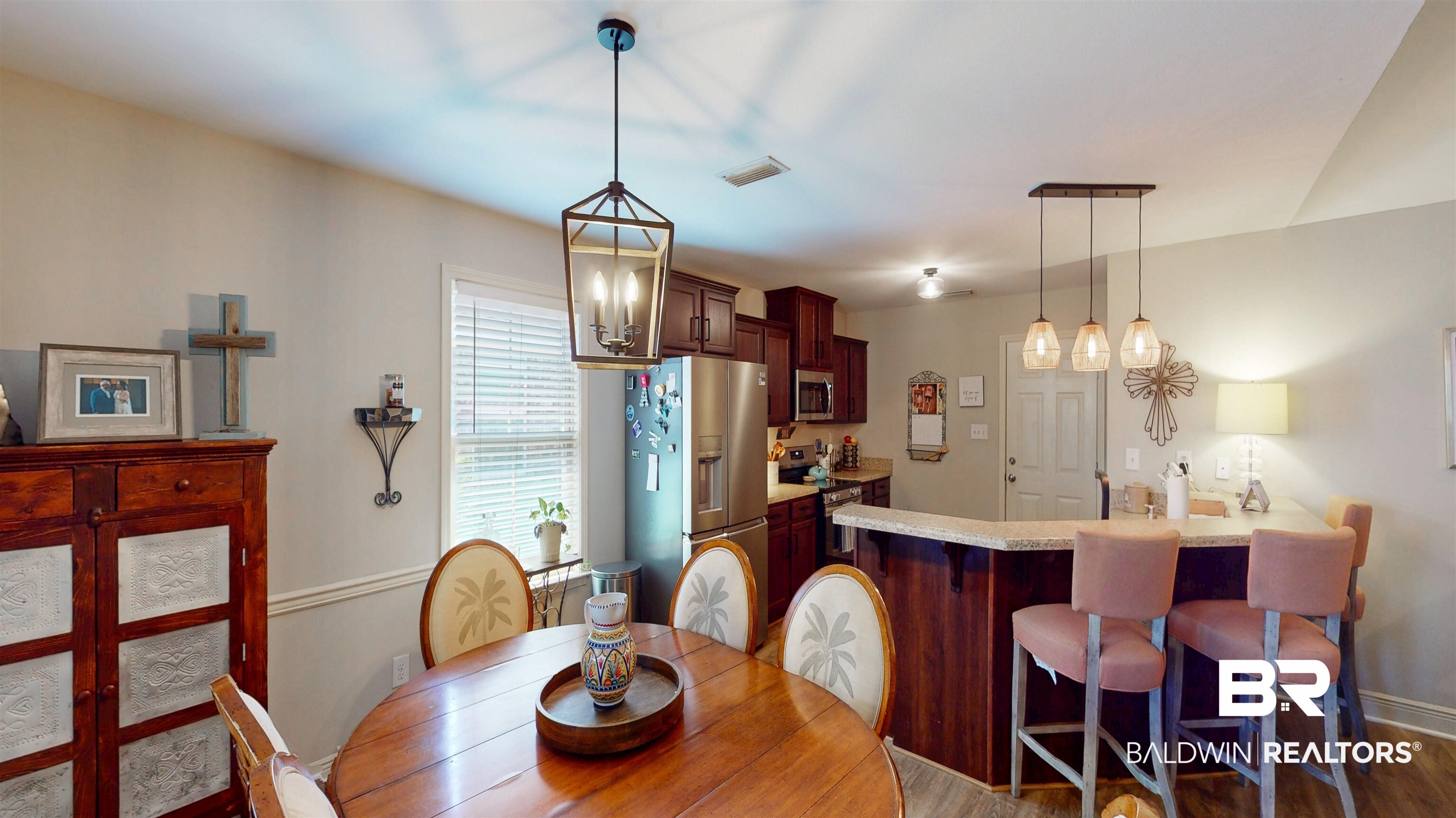 1304 Majesty Loop Foley, AL 36535 - Photo 11 of 44 Dining room featuring dark wood-style floors and suspended lighting