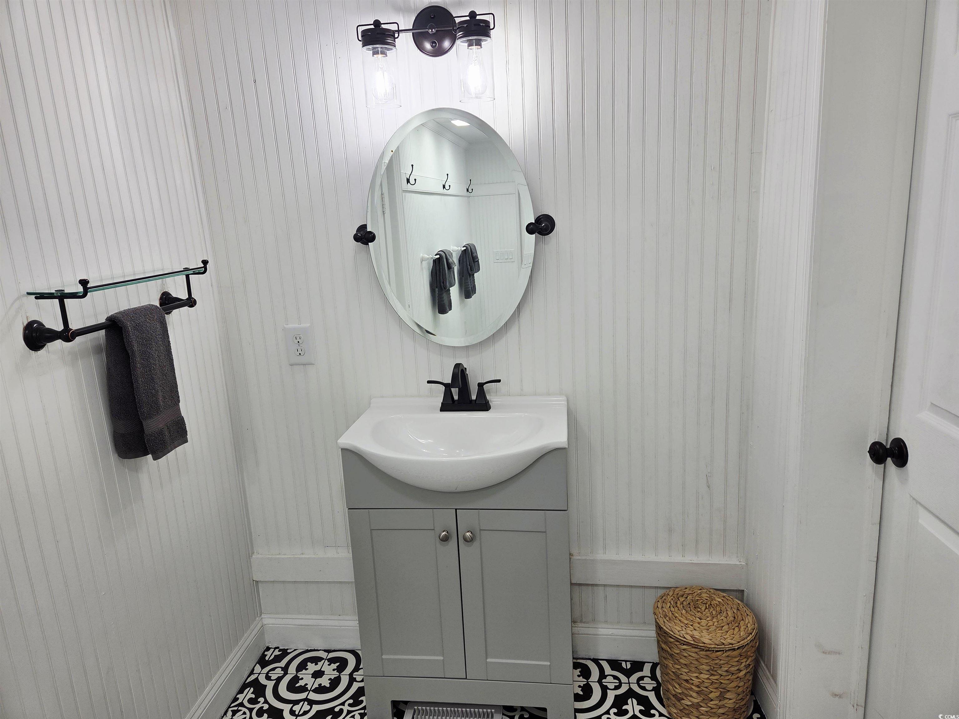 675 Liberty Church Road Loris, SC 29569 - Photo 13 of 35 Bathroom with tile patterned floors, baseboards, and vanity