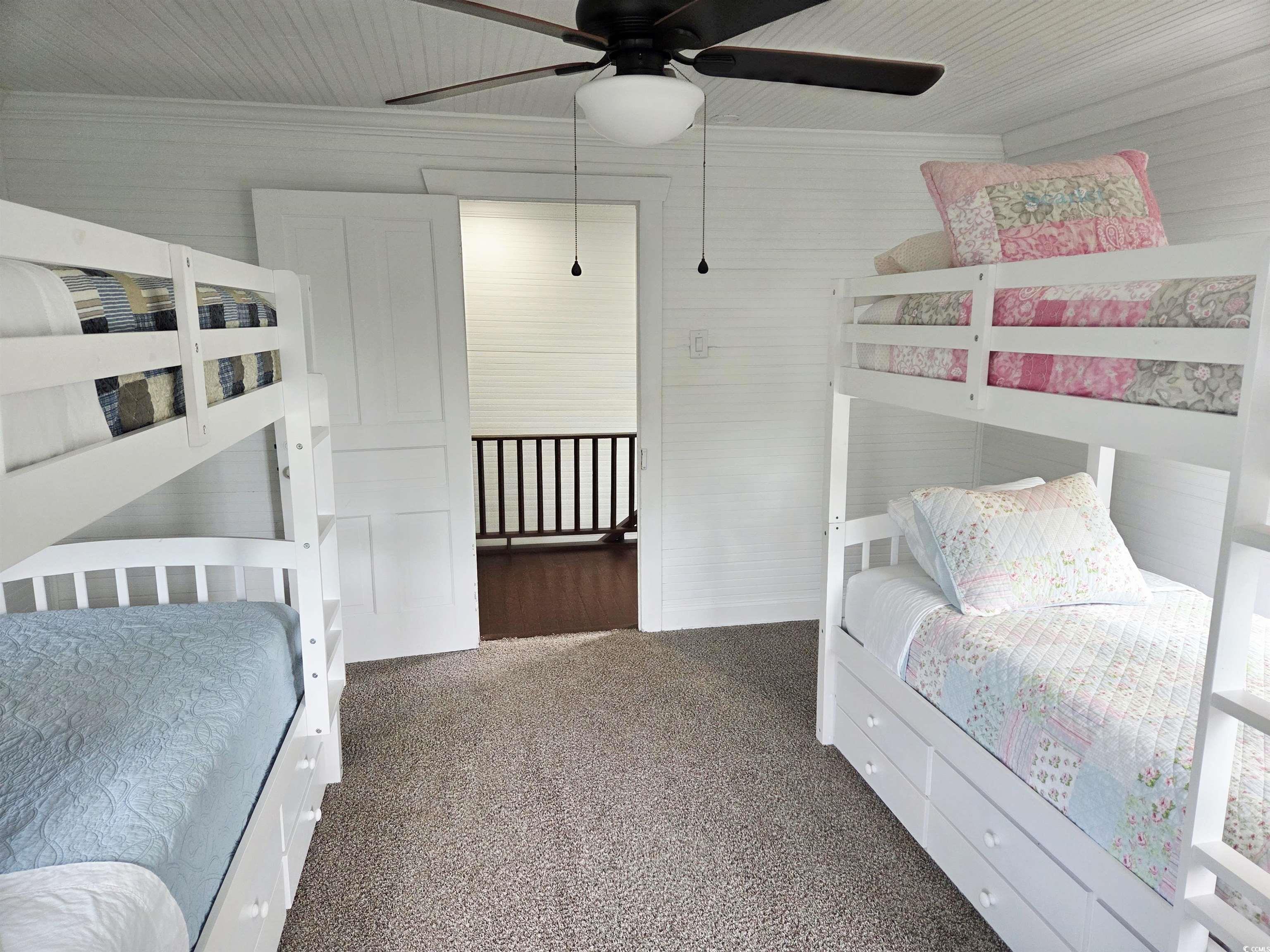 675 Liberty Church Road Loris, SC 29569 - Photo 27 of 35 Carpeted bedroom with crown molding and a ceiling fan