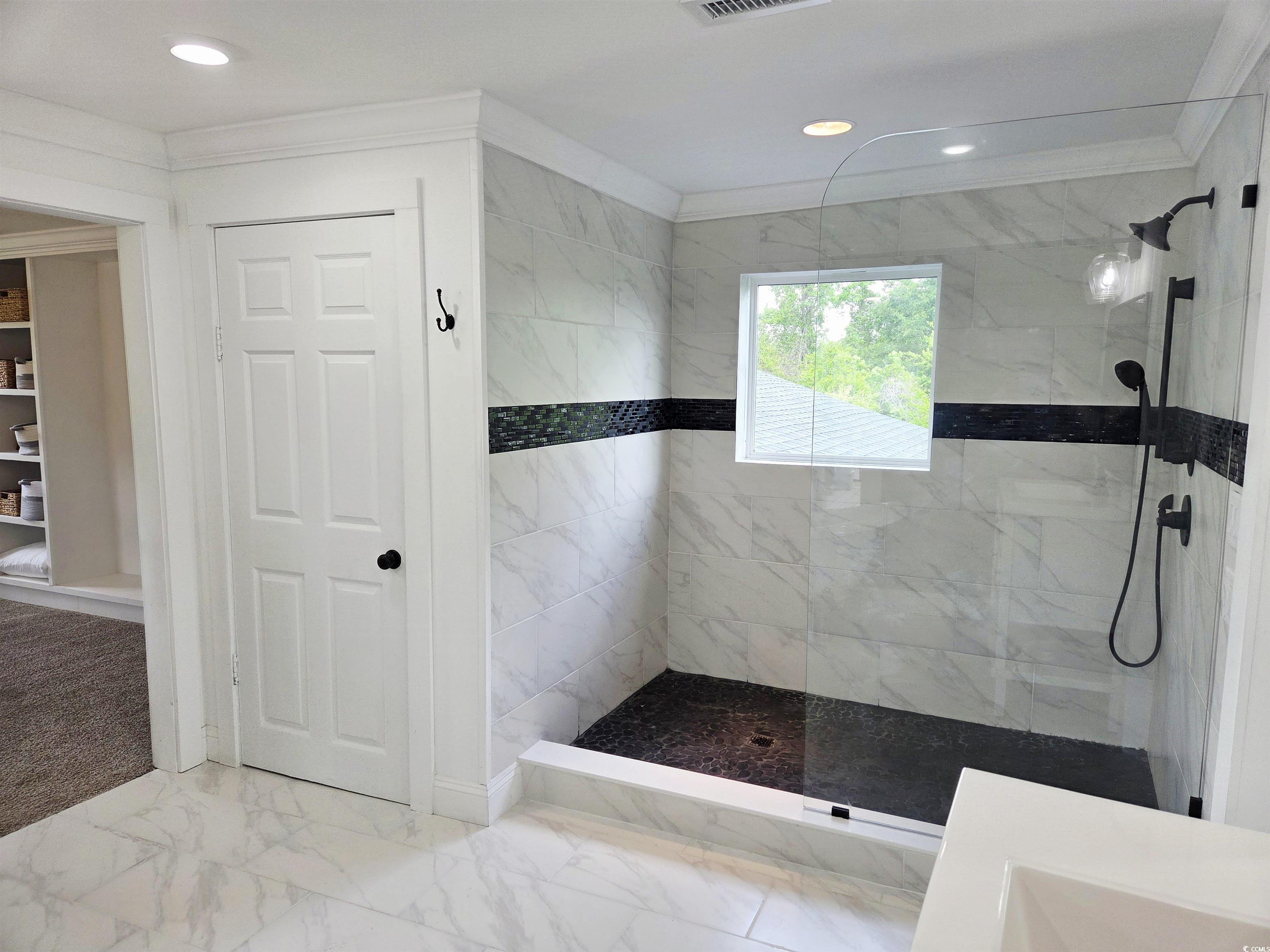 675 Liberty Church Road Loris, SC 29569 - Photo 32 of 35 Bathroom featuring walk in shower, marble finish floor, ornamental molding, and recessed lighting
