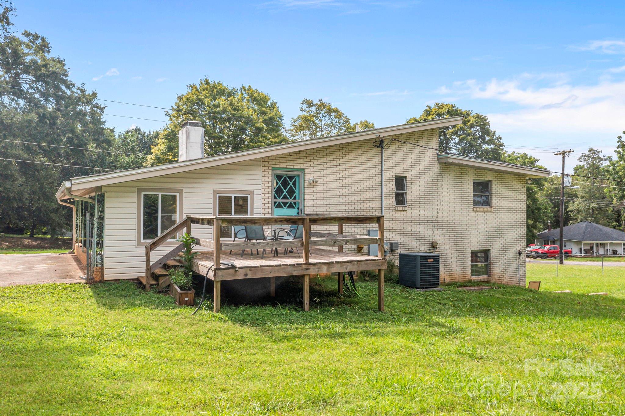 2988 Wesleyan Church Road Lincolnton, NC 28092 - Photo 21 of 24 a backyard of a house with yard fire pit and outdoor seating