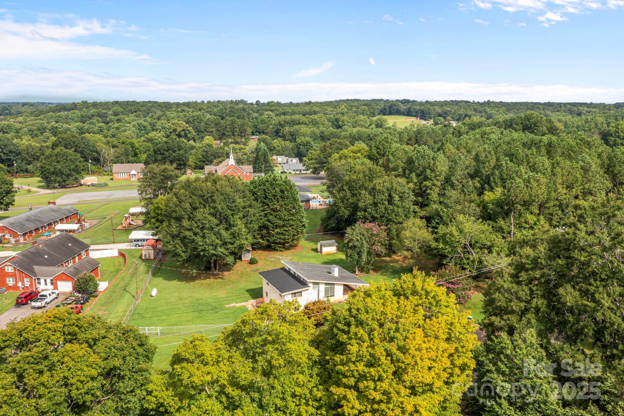 2988 Wesleyan Church Road Lincolnton, NC 28092 - Photo 24 of 24 a view of a lake with a city