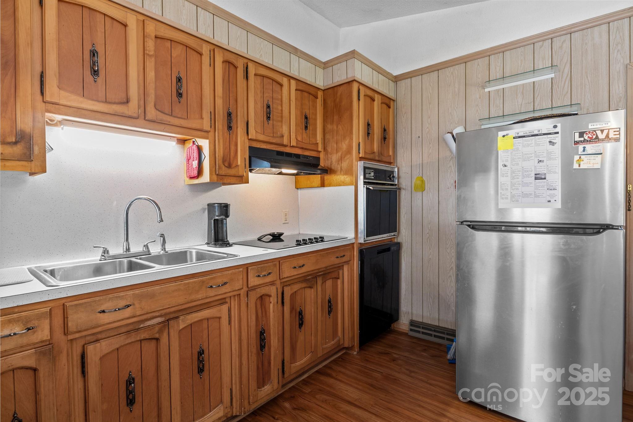2988 Wesleyan Church Road Lincolnton, NC 28092 - Photo 7 of 24 a kitchen with stainless steel appliances granite countertop a refrigerator sink and cabinets
