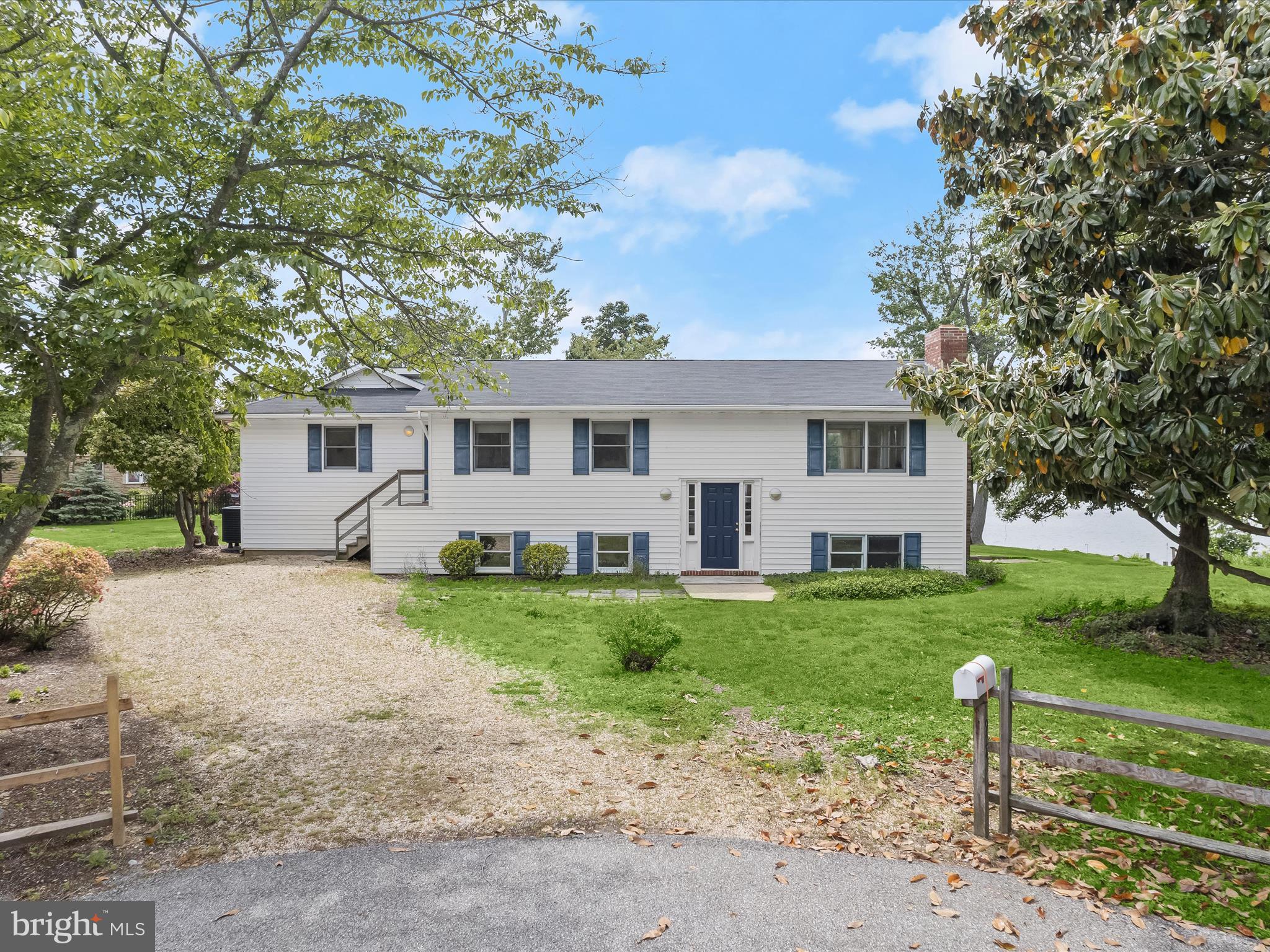 1924 Hidden Point Road Annapolis, MD 21409 - Photo 1 of 1 a view of a house with a yard and a large tree