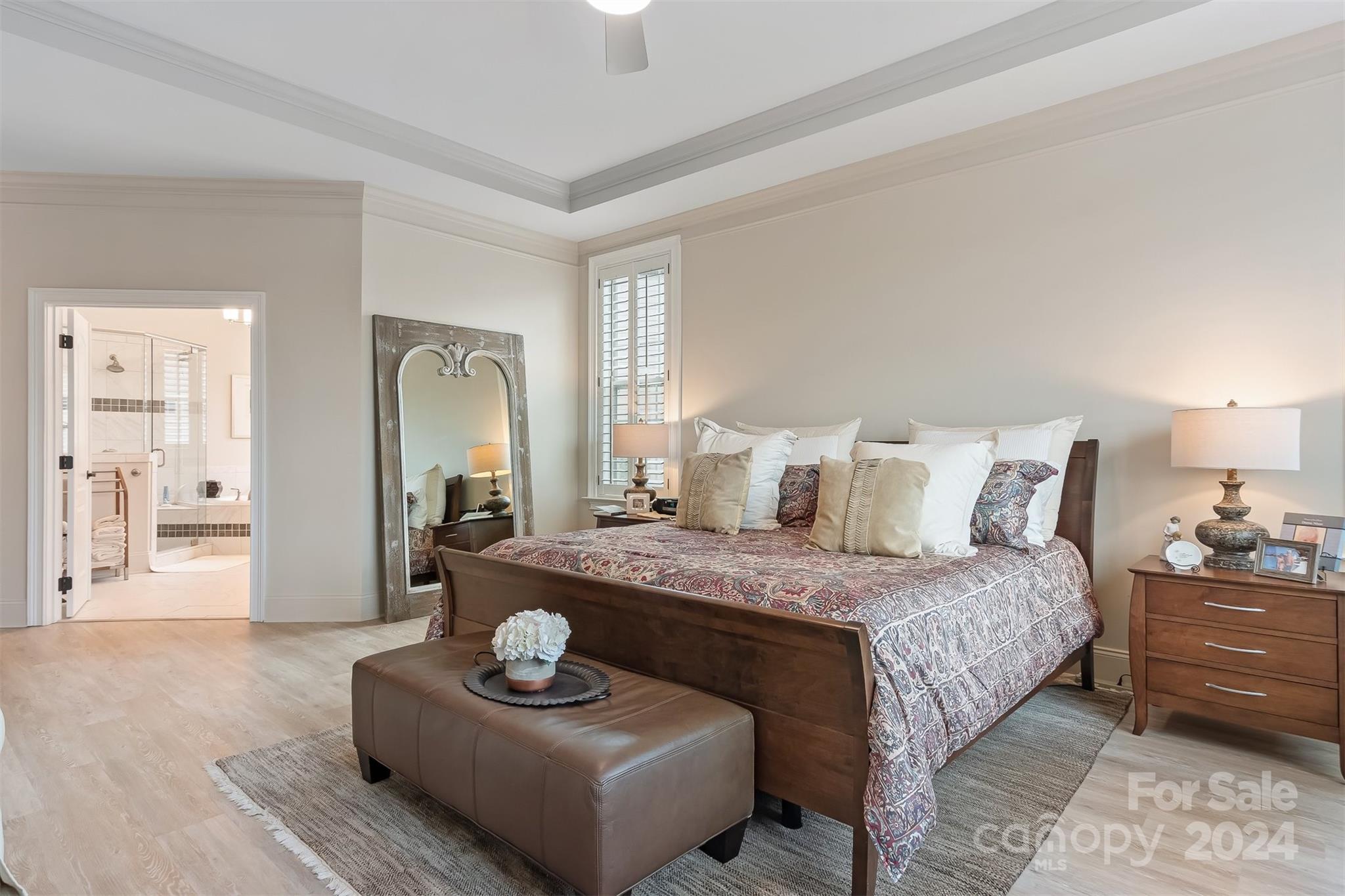 15608 Lake Ridge Road Charlotte, NC 28278 - Photo 17 of 37 a bedroom with bed and a couch