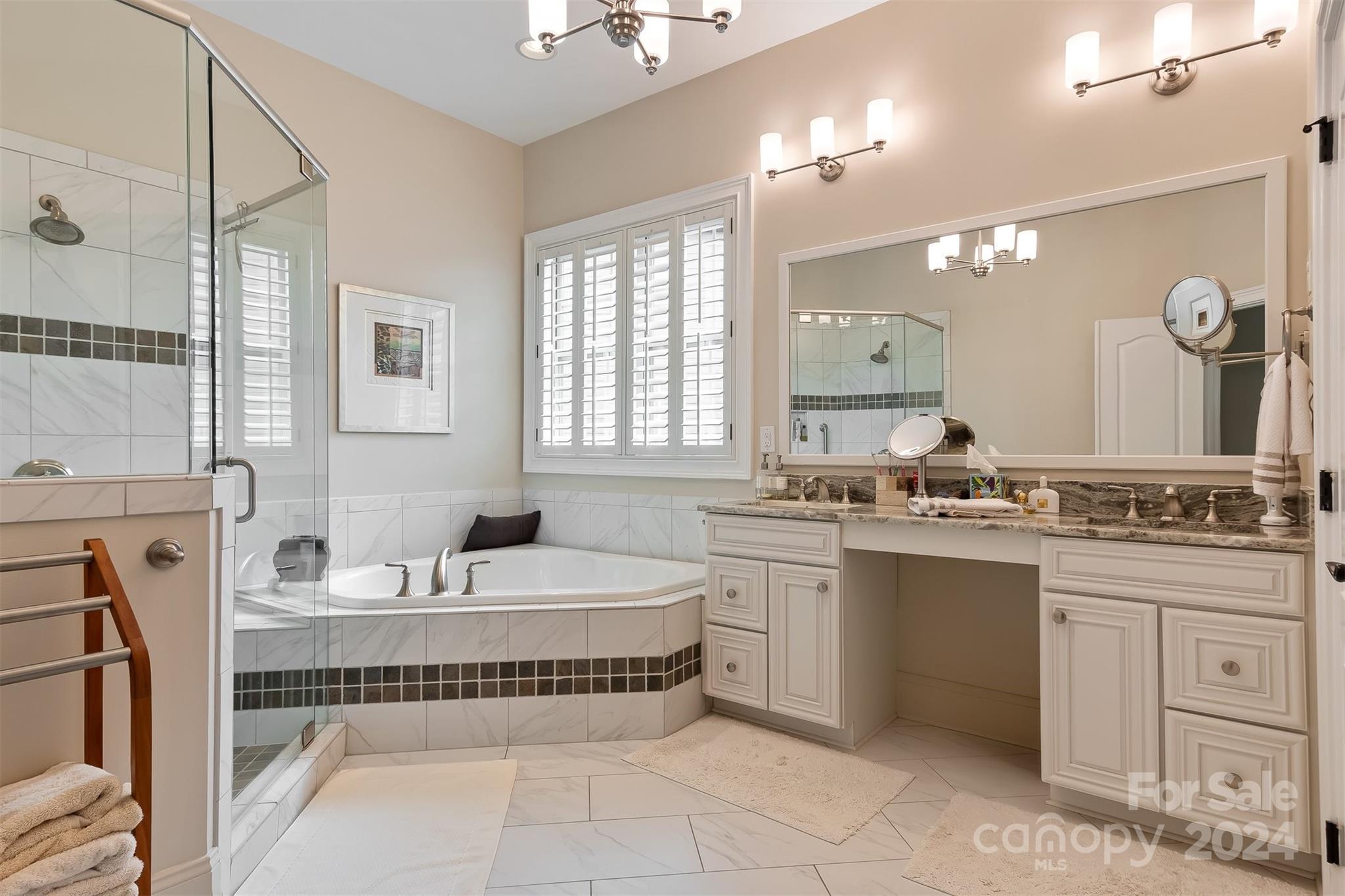 15608 Lake Ridge Road Charlotte, NC 28278 - Photo 18 of 37 a bathroom with a tub sink and mirror