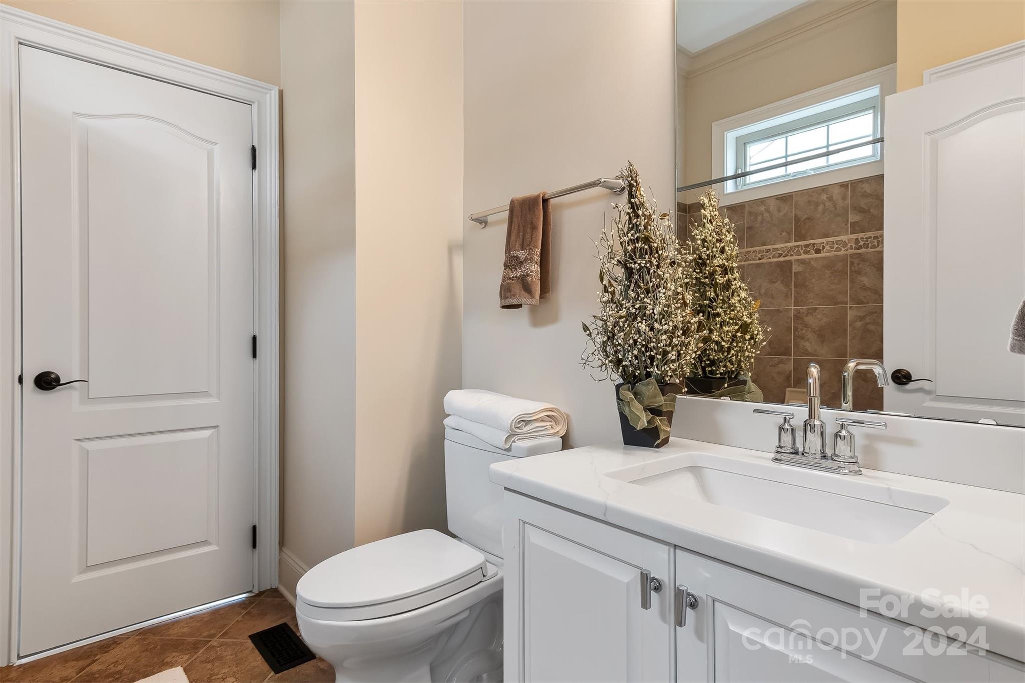 15608 Lake Ridge Road Charlotte, NC 28278 - Photo 22 of 37 a bathroom with a sink toilet and shower
