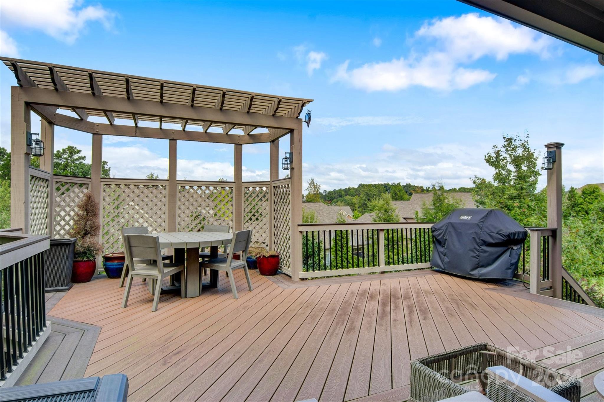 15608 Lake Ridge Road Charlotte, NC 28278 - Photo 29 of 37 a balcony with furniture and wooden floor