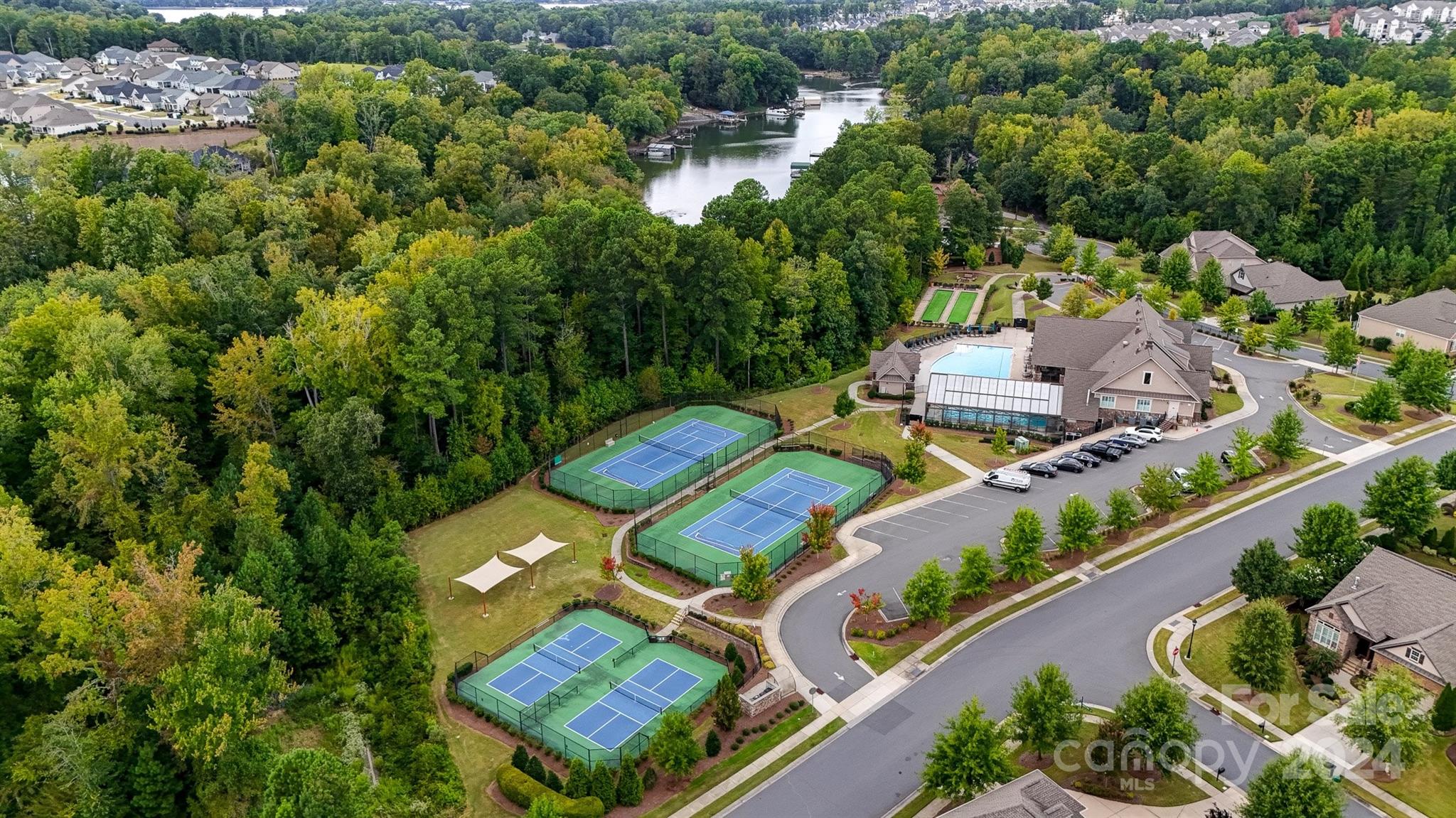 15608 Lake Ridge Road Charlotte, NC 28278 - Photo 32 of 37 an aerial view of a swimming pool outdoor seating and yard