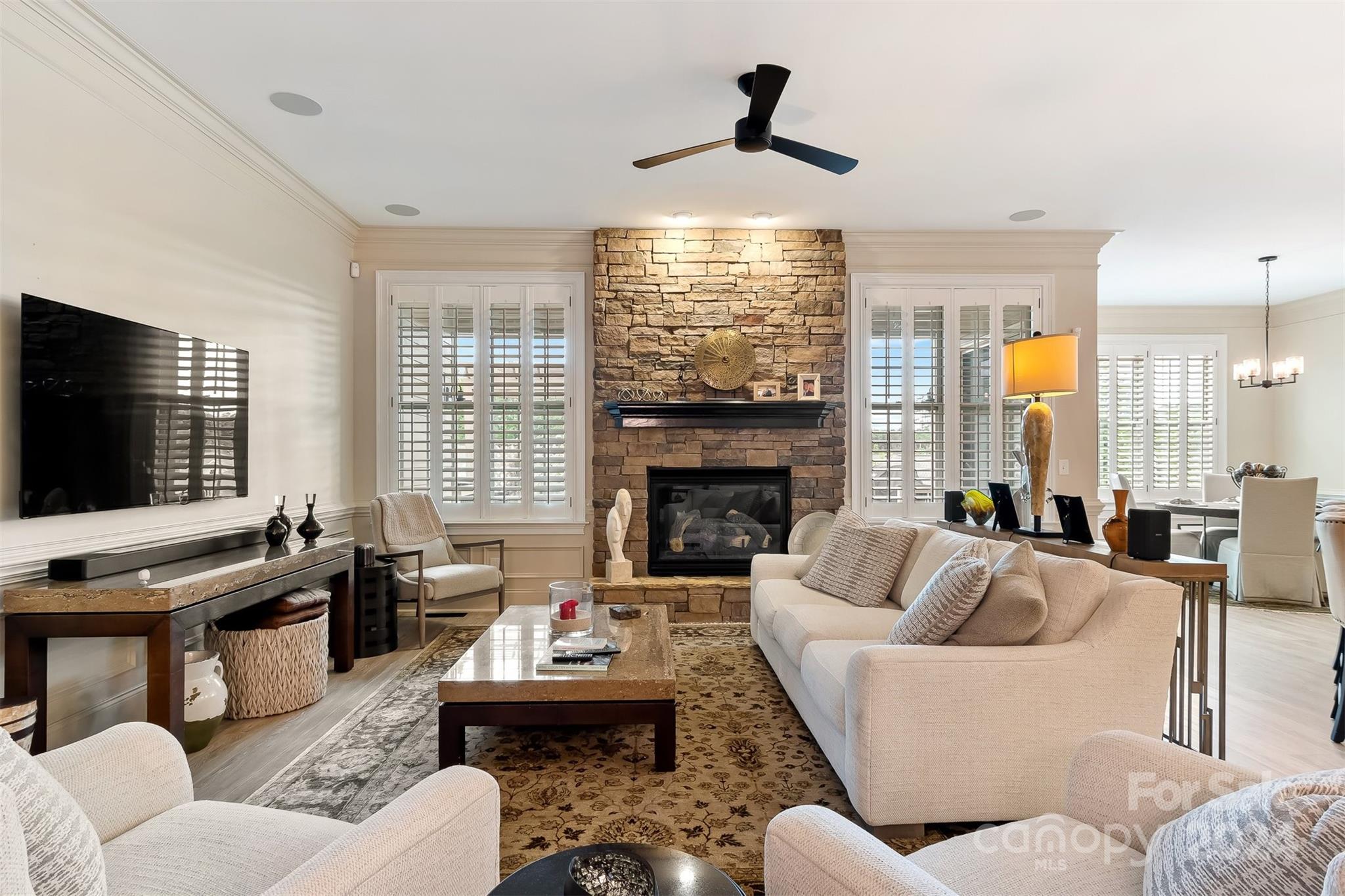 15608 Lake Ridge Road Charlotte, NC 28278 - Photo 6 of 37 a living room with furniture fireplace and flat screen tv