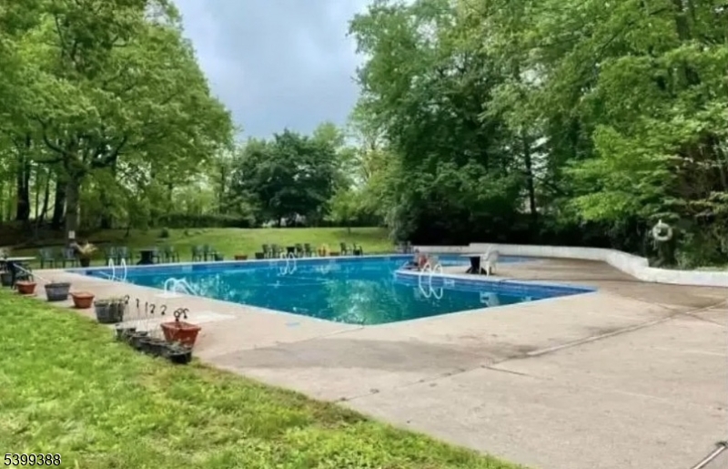 80 Troy Drive Springfield, NJ 07081 - Photo 10 of 11 a view of a garden with a sitting area