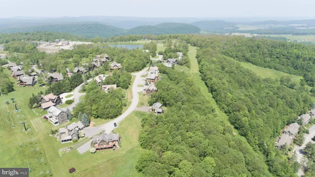 an aerial view of a city with lots of residential buildings