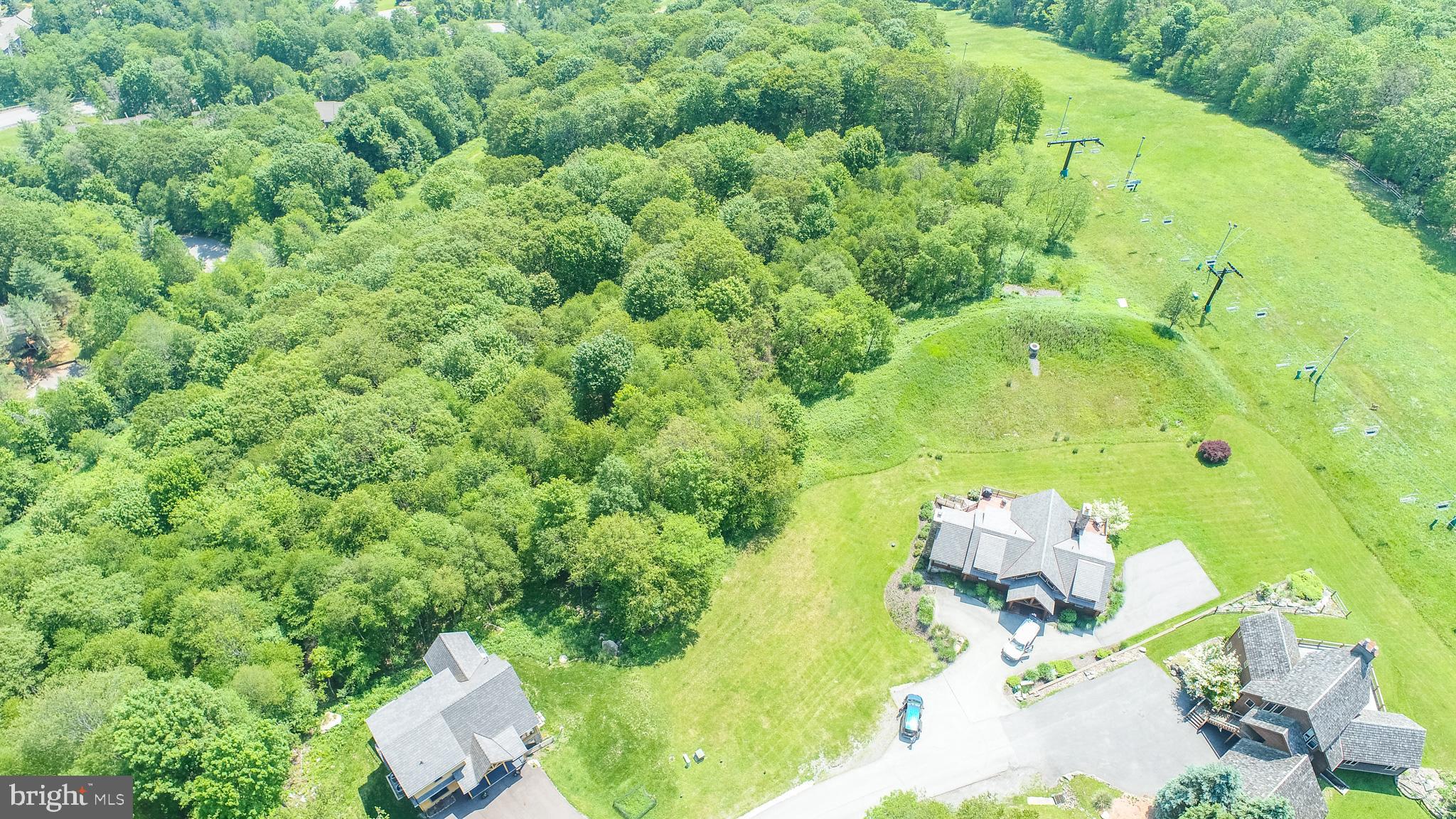 Lot 12 Boulder Ridge Drive McHenry, MD 21541 - Photo 4 of 17 an aerial view of a house with a yard