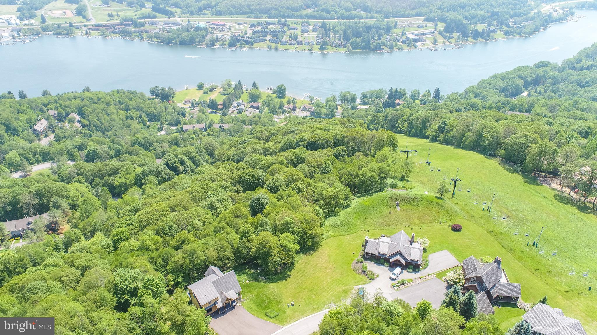 Lot 12 Boulder Ridge Drive McHenry, MD 21541 - Photo 5 of 17 an aerial view of lake residential house with outdoor space and trees around