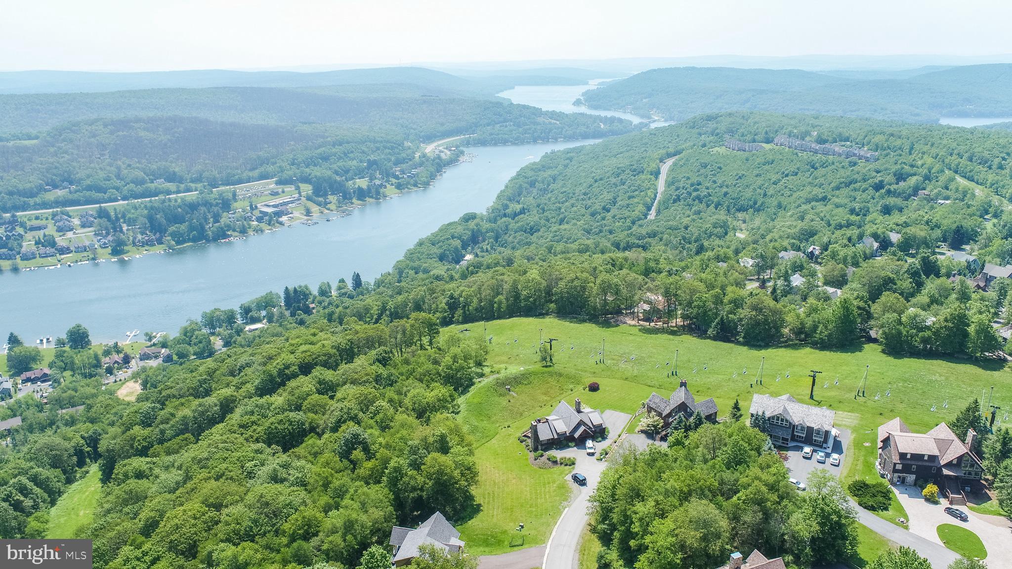 Lot 12 Boulder Ridge Drive McHenry, MD 21541 - Photo 7 of 17 a view of a lake with a mountain in the background