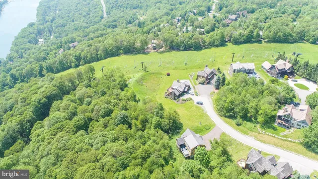 a view of a lake with a yard