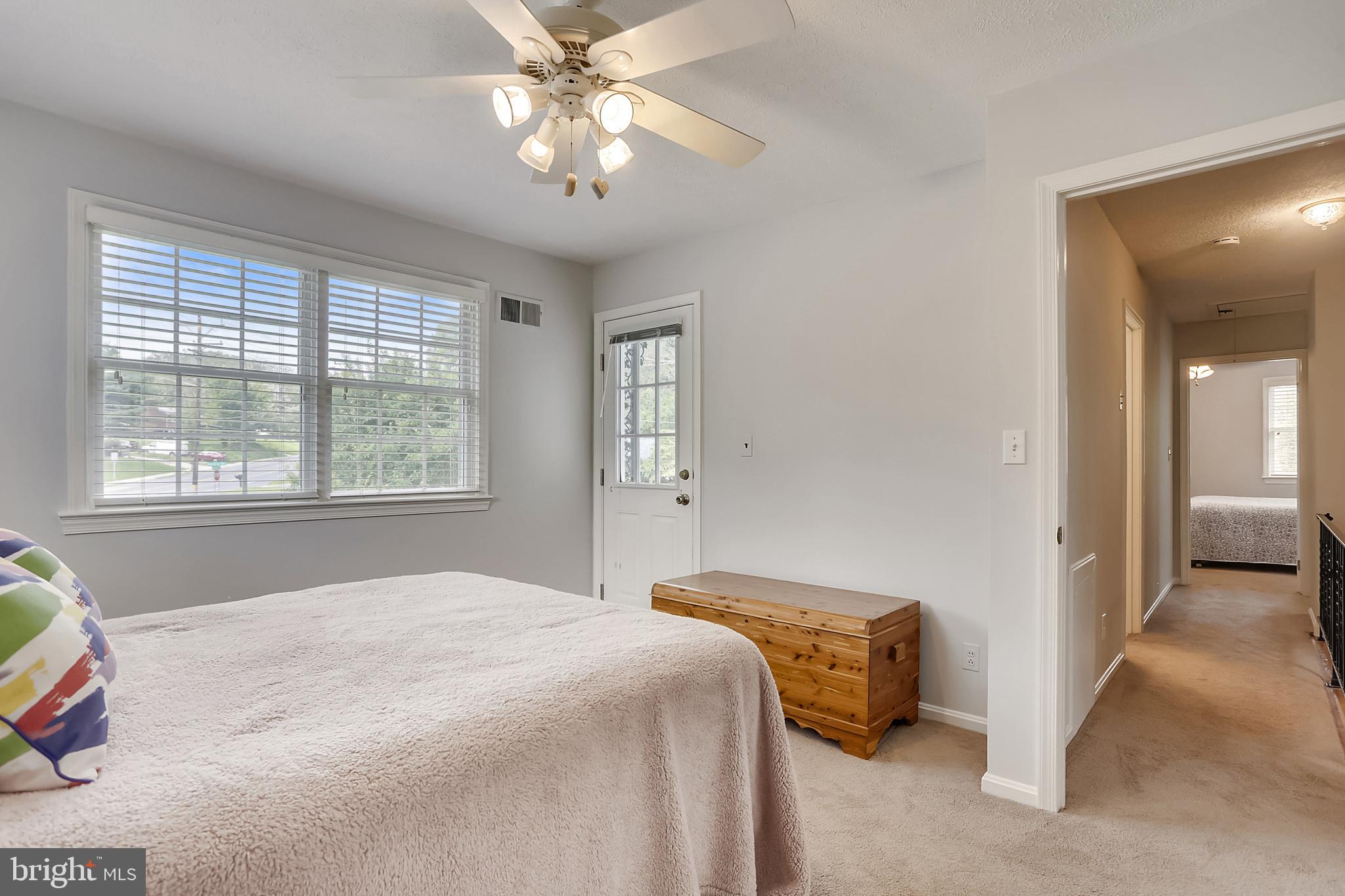 1900 Powder Mill Road Silver Spring, MD 20903 - Photo 25 of 57 Bedroom 2 with access to balcony and ceiling fan