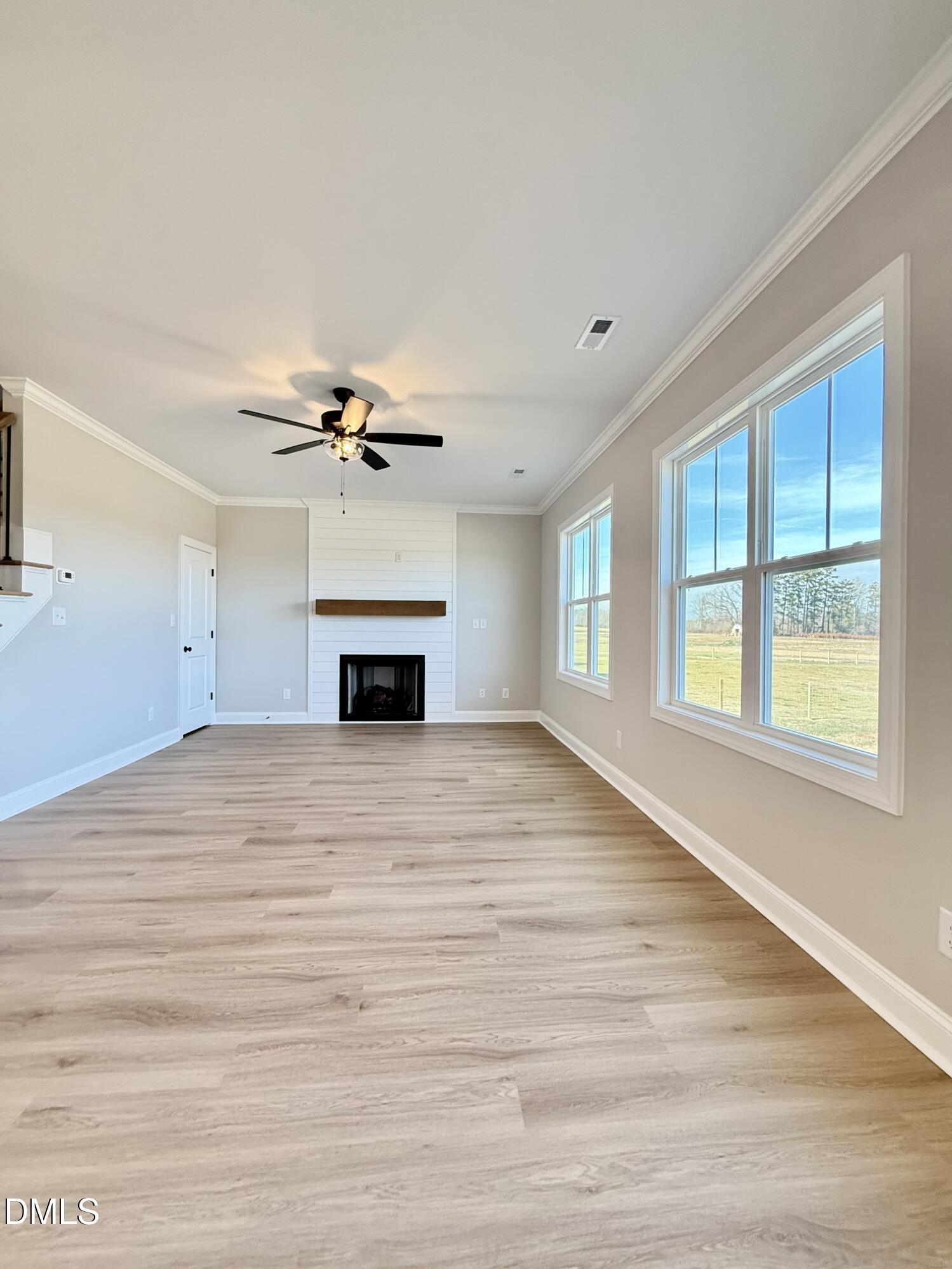 6862 Fire Tower Road Spring Hope, NC 27882 - Photo 11 of 35 a view of an empty room with a window and fireplace