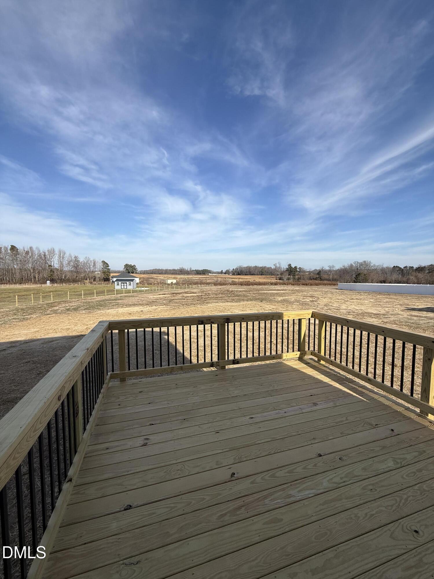 6862 Fire Tower Road Spring Hope, NC 27882 - Photo 12 of 35 a view of wooden floor with a lake