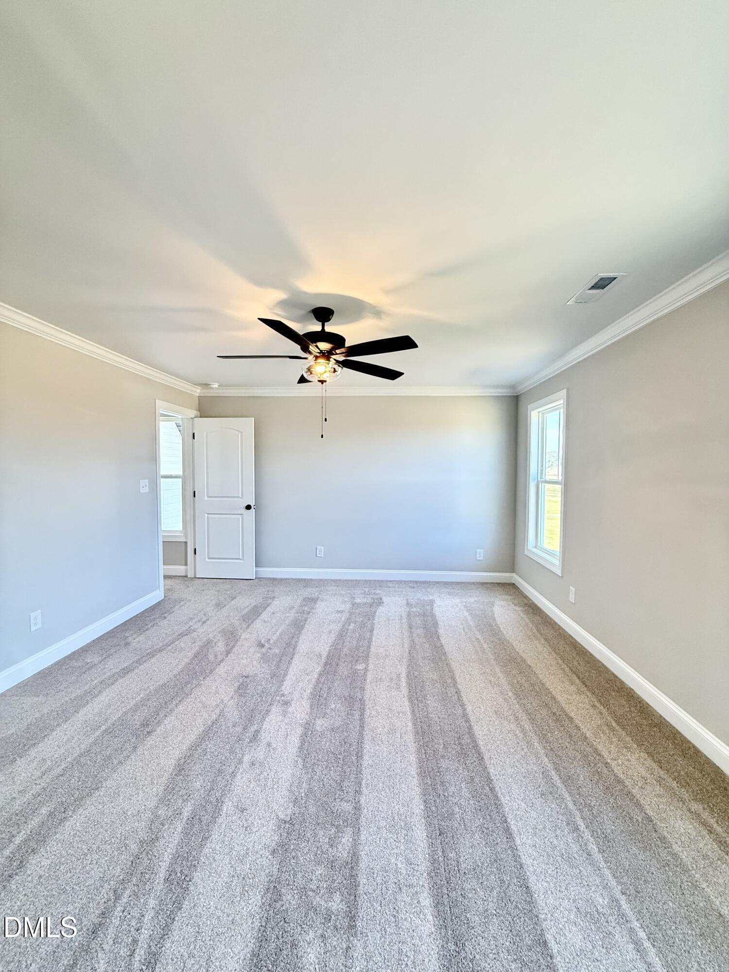 6862 Fire Tower Road Spring Hope, NC 27882 - Photo 15 of 35 wooden floor in an empty room with a window