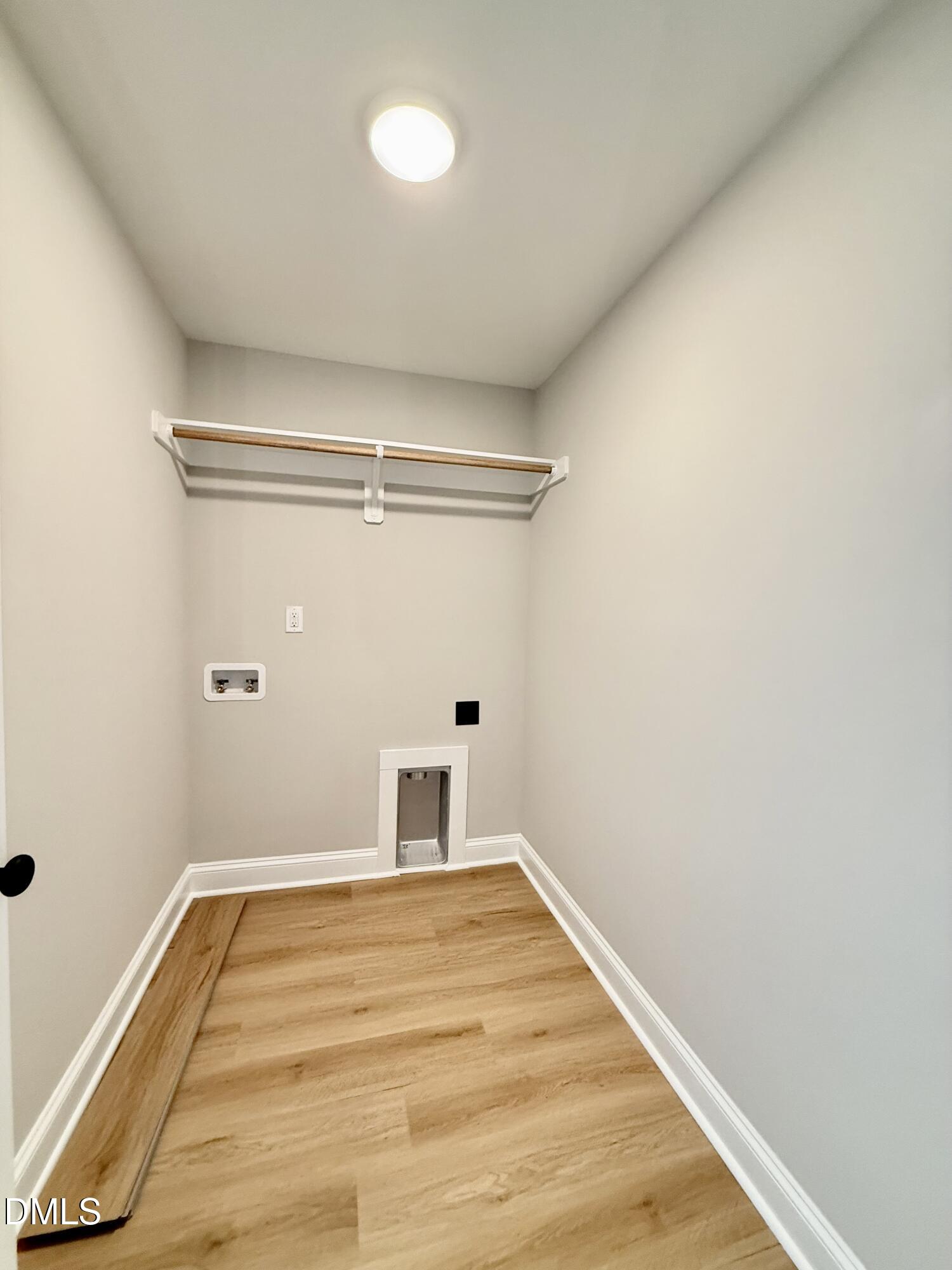 6862 Fire Tower Road Spring Hope, NC 27882 - Photo 24 of 35 a view of a room with wooden floor and white walls