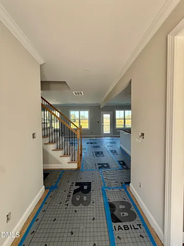 a kitchen with granite countertop a stove and a refrigerator