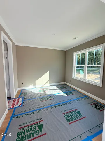 a view of an empty room and window