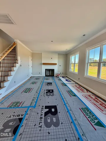 a living room with furniture and a table