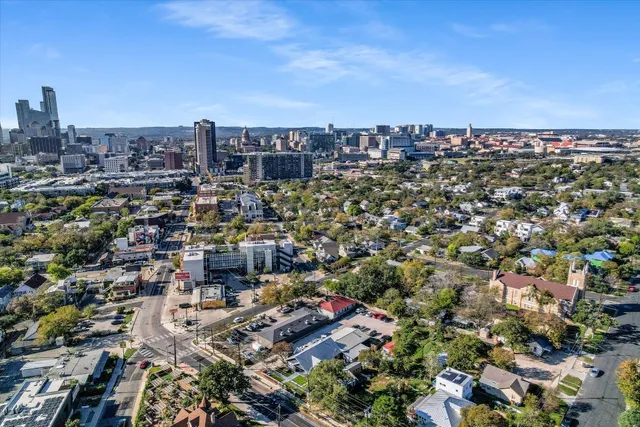 an aerial view of a city with lots of residential buildings