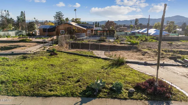 a view of a lake with a house