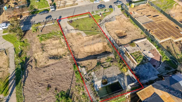 an aerial view of a backyard with plants