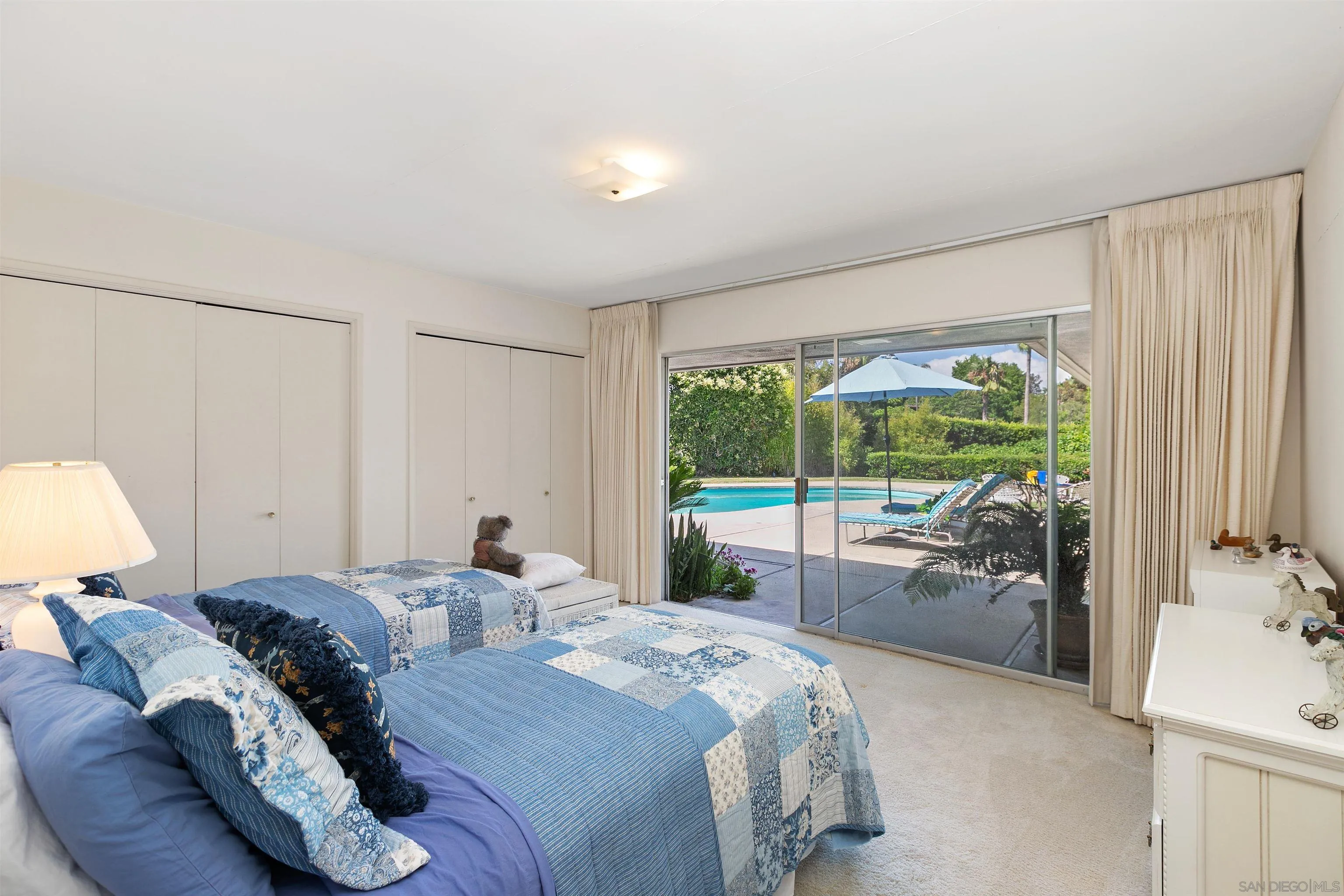 6350 Mimulus Rancho Santa Fe, CA 92067 - Photo 14 of 21 a bed room with two bed and a large window