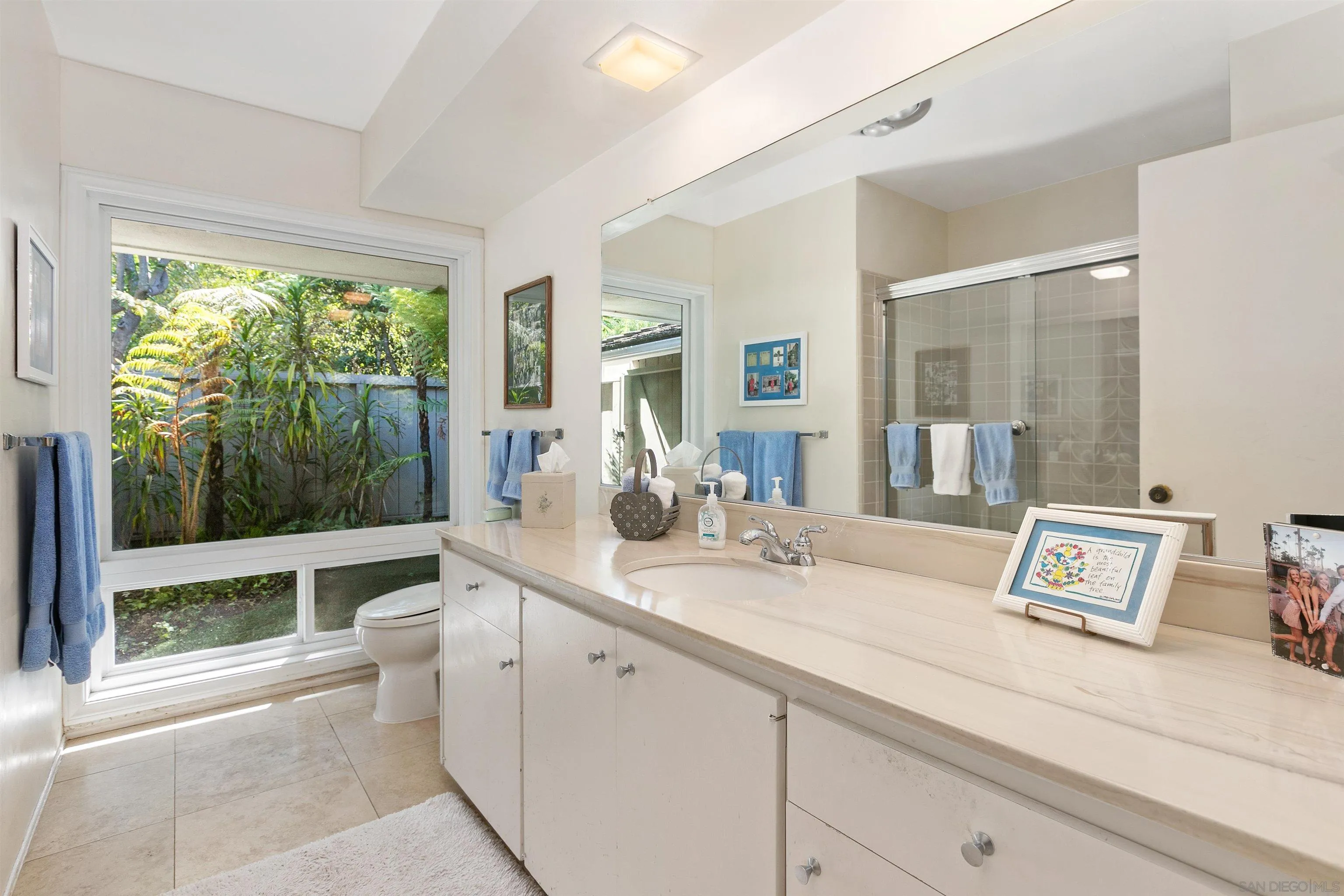 6350 Mimulus Rancho Santa Fe, CA 92067 - Photo 17 of 21 a spacious bathroom with a tub sink and mirror