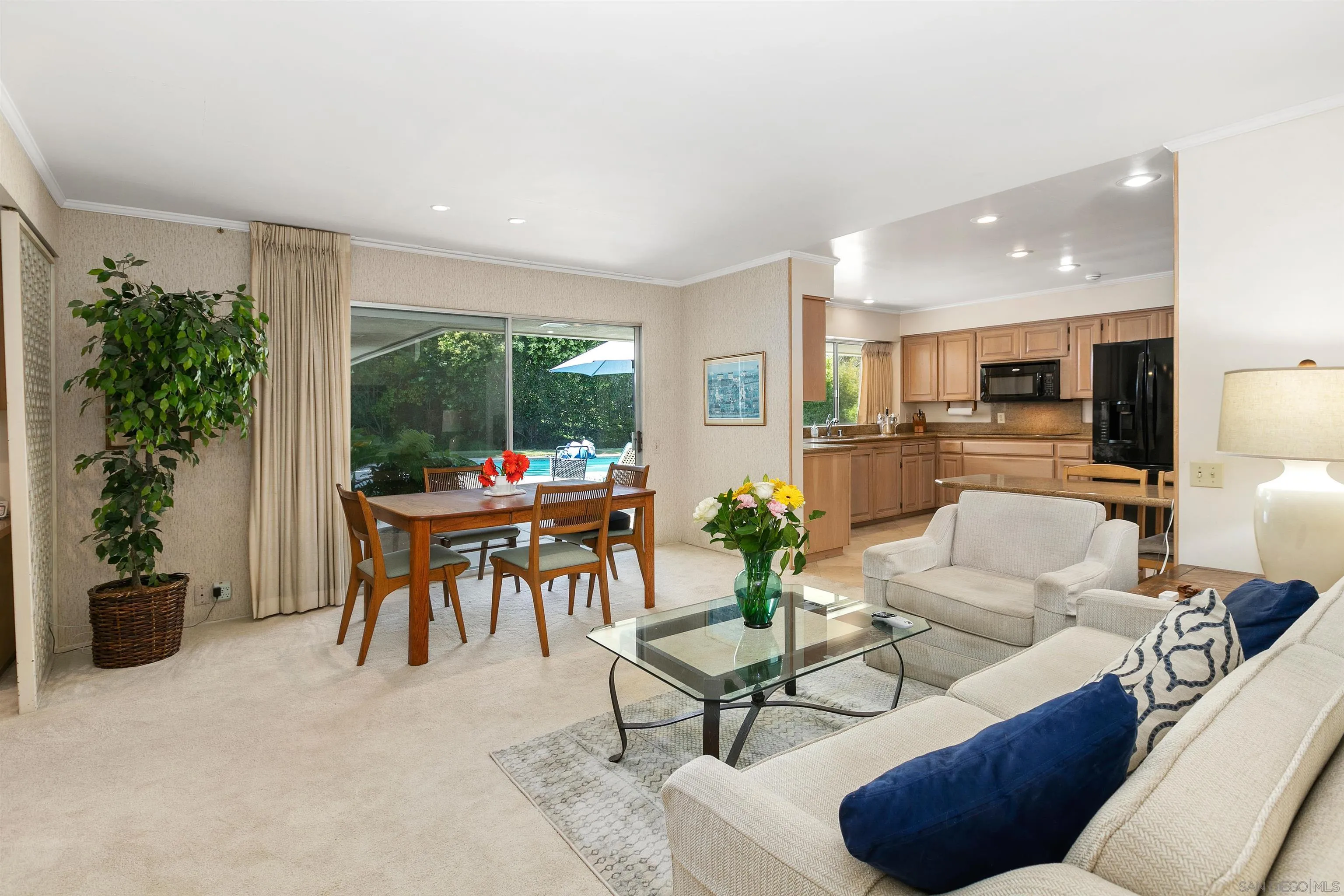 6350 Mimulus Rancho Santa Fe, CA 92067 - Photo 10 of 21 a living room with furniture a potted plant and a table